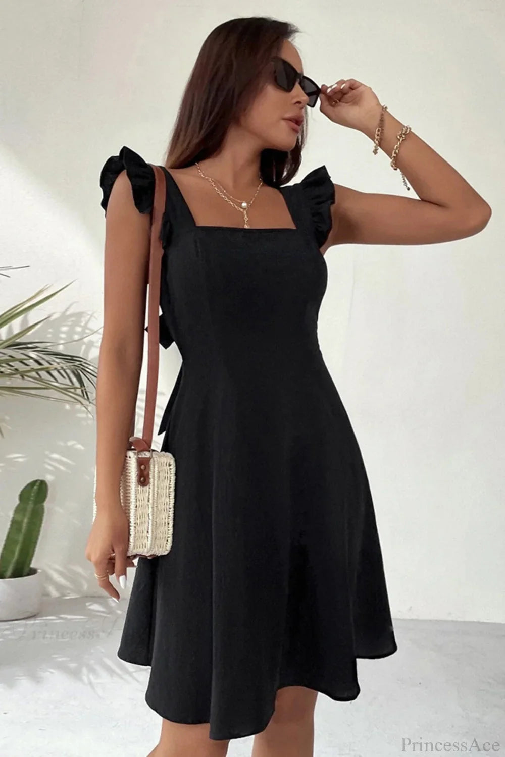 Bianca Sleeveless Mini Dress with Ruffle Tie-back
